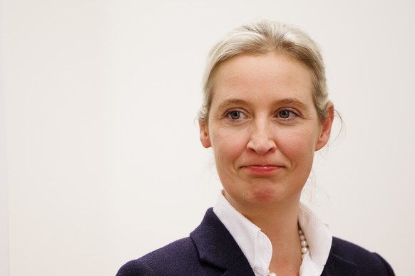 epa11619833 Alternative for Germany (AfD) party and faction co-chairwoman Alice Weidel looks on in the regional state parliament during the regional state parliament election in Brandenburg, in Potsda ...