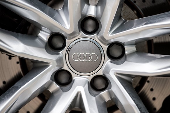 epa05849181 The Audi AG logo sign is seen on an AUDI car ahead of the balance sheet press conference at the company&#039;s headquarters in Ingolstadt, Germany, 15 March 2017. EPA/CHRISTIAN BRUNA
