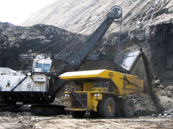 FILE - In this April 30, 2007, file photo, a shovel prepares to dump a load of coal into a 320-ton truck at the Arch Coal Inc.-owned Black Thunder mine in Wright, Wyo. Arch Coal filed for Chapter 11 b ...