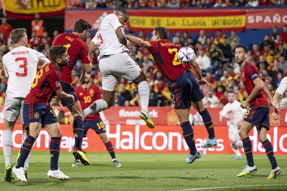 Switzerland&#039;s defender Manuel Akanji, center left, scores with a header against Spain&#039;s defender Cesar Azpilicueta to 0:1, during the UEFA Nations League group A2 soccer match between Spain  ...