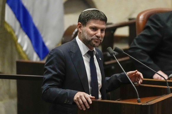 FILE - Israeli Finance Minister Bezalel Smotrich speaks at the Knesset, Israel&#039;s parliament, in Jerusalem, on July 10, 2023. Smotrich, a settler leader who lives in the West Bank, is part of the  ...