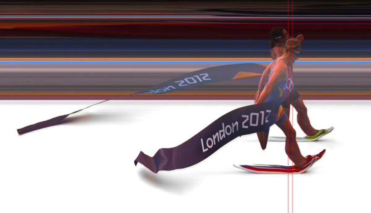 This handout photograph released by Omega, the official timekeeper of the London 2012 Olympic games, shows the finish of the women's triathlon race for The 2012 London Olympic Games in London on  ...