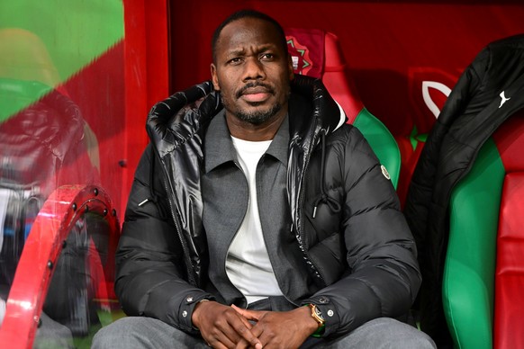 Senegal's head coach Pape Thiaw sits on the bench before the Africa Cup of Nations semifinal soccer match between Senegal and Egypt, in Tangier, Morocco, Wednesday, Jan. 14, 2026. (AP Photo/Moham ...