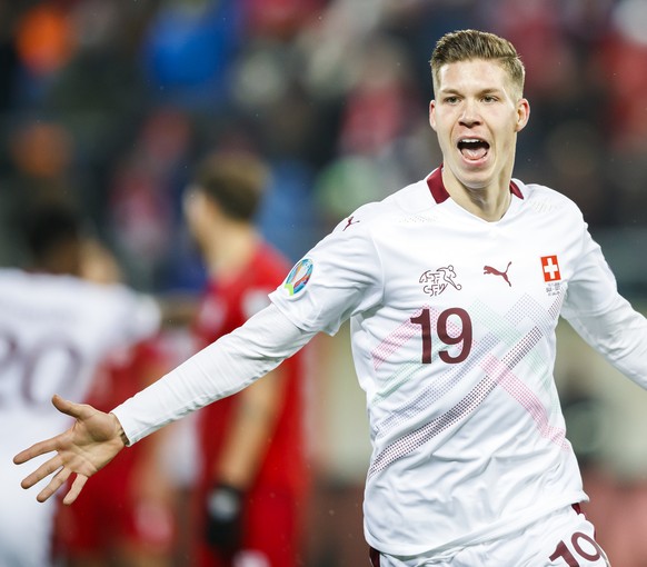 Switzerland&#039;s midfielder Cedric Itten celebrates his goal during the UEFA Euro 2020 qualifying Group D soccer match between Switzerland and Georgia at the Kybunpark stadium in St. Gallen, Switzer ...