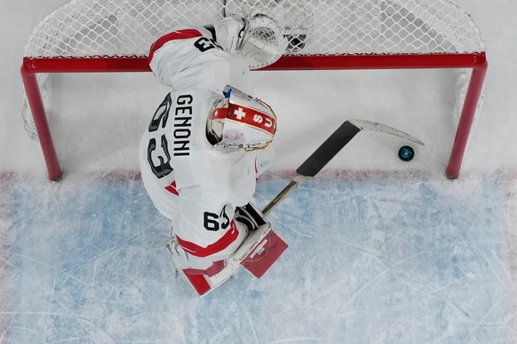 Switzerland's Leonardo Genoni (63) reacts after Finland's Artturi Lehkonen scored his side's second goal during a men's ice hockey quarterfinal game between Finland and Switzerland ...
