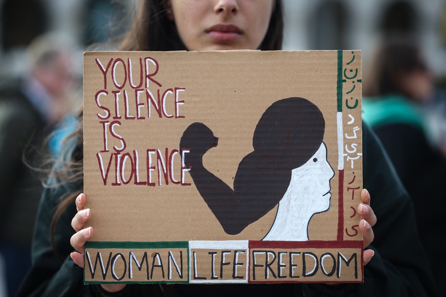 epa10314905 People take part in the demonstration in support of the revolution in Iran, in Lisbon, Portugal, 19 November 2022. In memory of the over 3,000 Islamic Republic victims who were killed duri ...