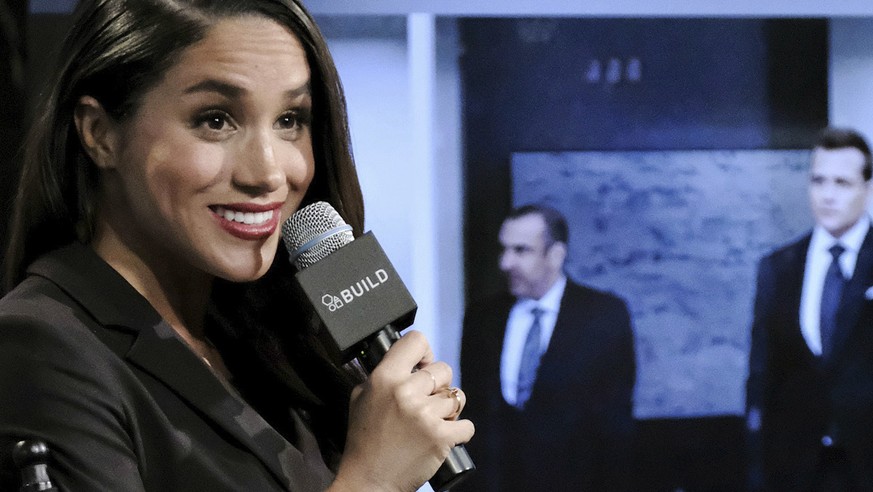 FILE - In this Thursday, March 17, 2016 file photo, actress Meghan Markle participates in AOL&#039;s BUILD Speaker Series to discuss her role on the television show, &quot;Suits&quot;, in New York. Br ...