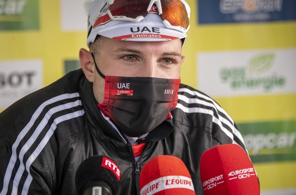 Marc Hirschi from Switzerland of UAE Team Emirates speaks to journalists during the third stage, a 168,7 km race between Estavayer and Estavayer at the 74th Tour de Romandie UCI ProTour cycling race i ...