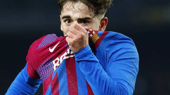 Barcelona&#039;s Gavi celebrates after scoring his side&#039;s second goal during the Spanish La Liga soccer match between Barcelona and Elche at the Camp Nou stadium, in Barcelona, Spain, Saturday, D ...