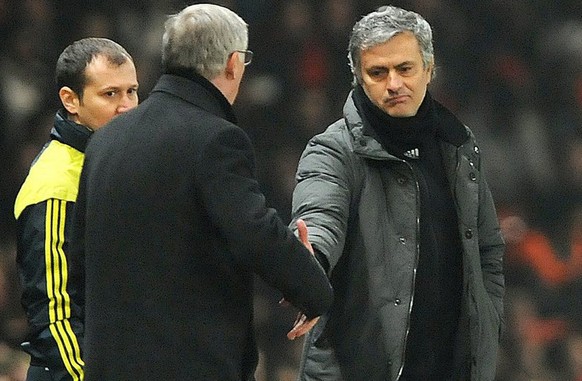 epa03611313 Real Madrid&#039;s manager Jose Mourinho (R with Manchester United manager Sir Alex Ferguson (L) at the end of the UEFA Champions League match between Manchester United and Real Madrid at  ...