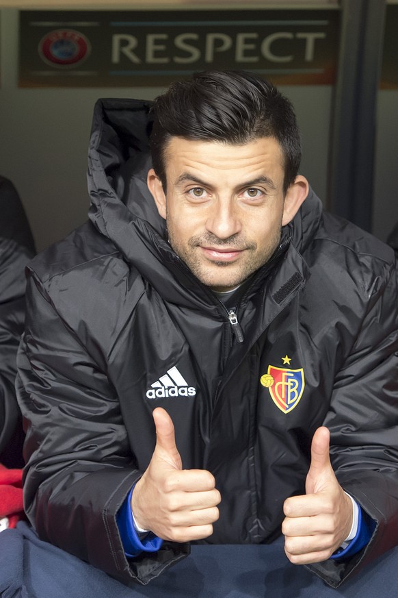 Basel&#039;s Behrang Safari gives the thumbs up prior to the UEFA Europa League group I group stage matchday 6 soccer match between Poland&#039;s KKS Lech Poznan and Switzerland&#039;s FC Basel 1893 a ...