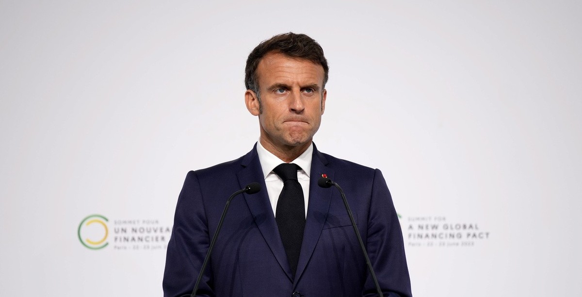 epa10707879 French President Emmanuel Macron reacts during a joint press conference at the end of the New Global Financial Pact Summit, Paris, France, 23 June 2023. The two-day summit aimed at seeking ...