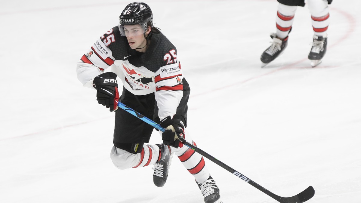 Canada's Owen Power controls the puck during the Ice Hockey World Championship semifinal match between the United States and Canada at the Arena in Riga, Latvia, Saturday, June 5, 2021. (AP Photo ...