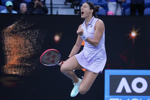 Caroline Garcia of France celebrates after defeating Leylah Fernandez of Canada in their second round match at the Australian Open tennis championship in Melbourne, Australia, Thursday, Jan. 19, 2023. ...