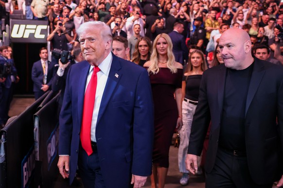 President Donald Trump attends UFC 327 at Kaseya Center, Saturday, April 11, 2026, in Miami, with Dana White. (Tasos Katopodis/Pool via AP)
Trump
