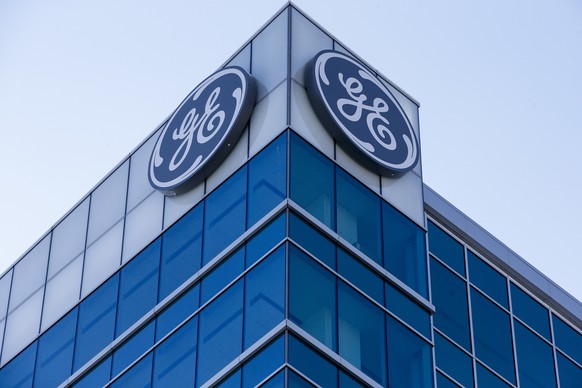 The General Electric logo is displayed at the top of their Global Operations Center, Tuesday, Jan. 16, 2018, in the Banks development of downtown Cincinnati. GE CEO John Flannery, who was put in charg ...