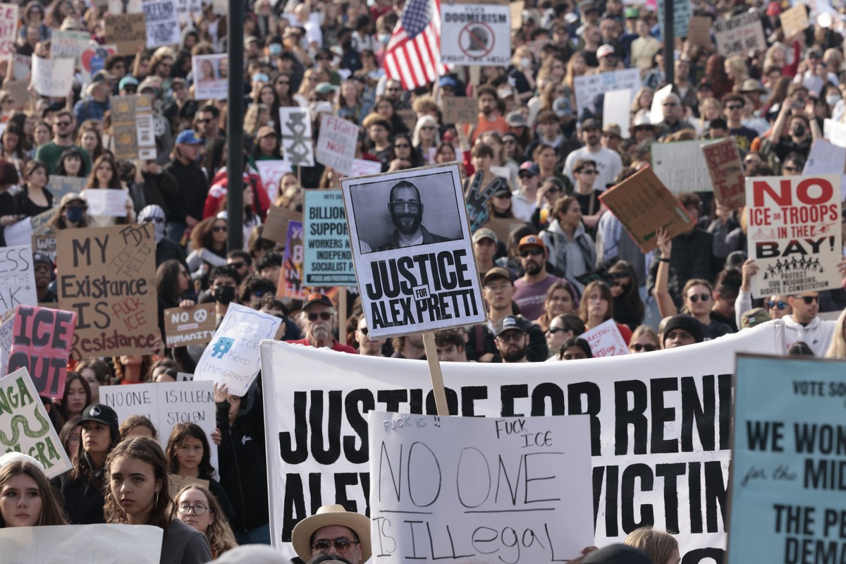 EDS NOTE: OBSCENITY - People gather at Dolores Park as part of a nationwide shutdown effort in response to the ongoing federal immigration raids and unrest in Minneapolis, in San Francisco on Friday,  ...