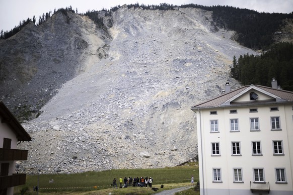 The rocks of a rockslide are seen during a media tour in Brienz, Switzerland, Wednesday, June 28, 2023. Brienz was evacuated on May 12 after geology experts warned that Alpine rock looming over the vi ...