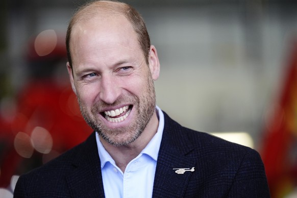 Britain&#039;s Prince William smiles during his visit to RAF Northolt, England, Tuesday, Oct. 1, 2024. (Aaron Chown, Pool Photo via AP)