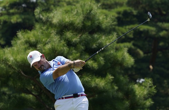 Rory Sabbatini of Slovakia watches his tee shot on the 13th hole during the final round of the men&#039;s golf event at the 2020 Summer Olympics on Sunday, Aug. 1, 2021, in Kawagoe, Japan. (AP Photo/M ...