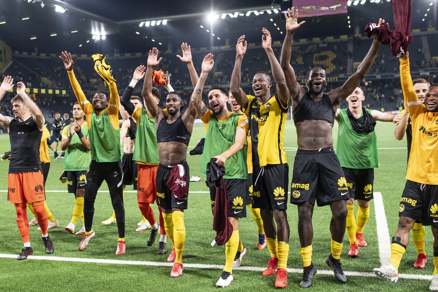 YB's players celebrate after winning the UEFA Champions League 2nd leg third qualifying round soccer match between BSC Young Boys and CFR Cluj of Romania, at the Wankdorf stadium on Tuesday, August 10 ...