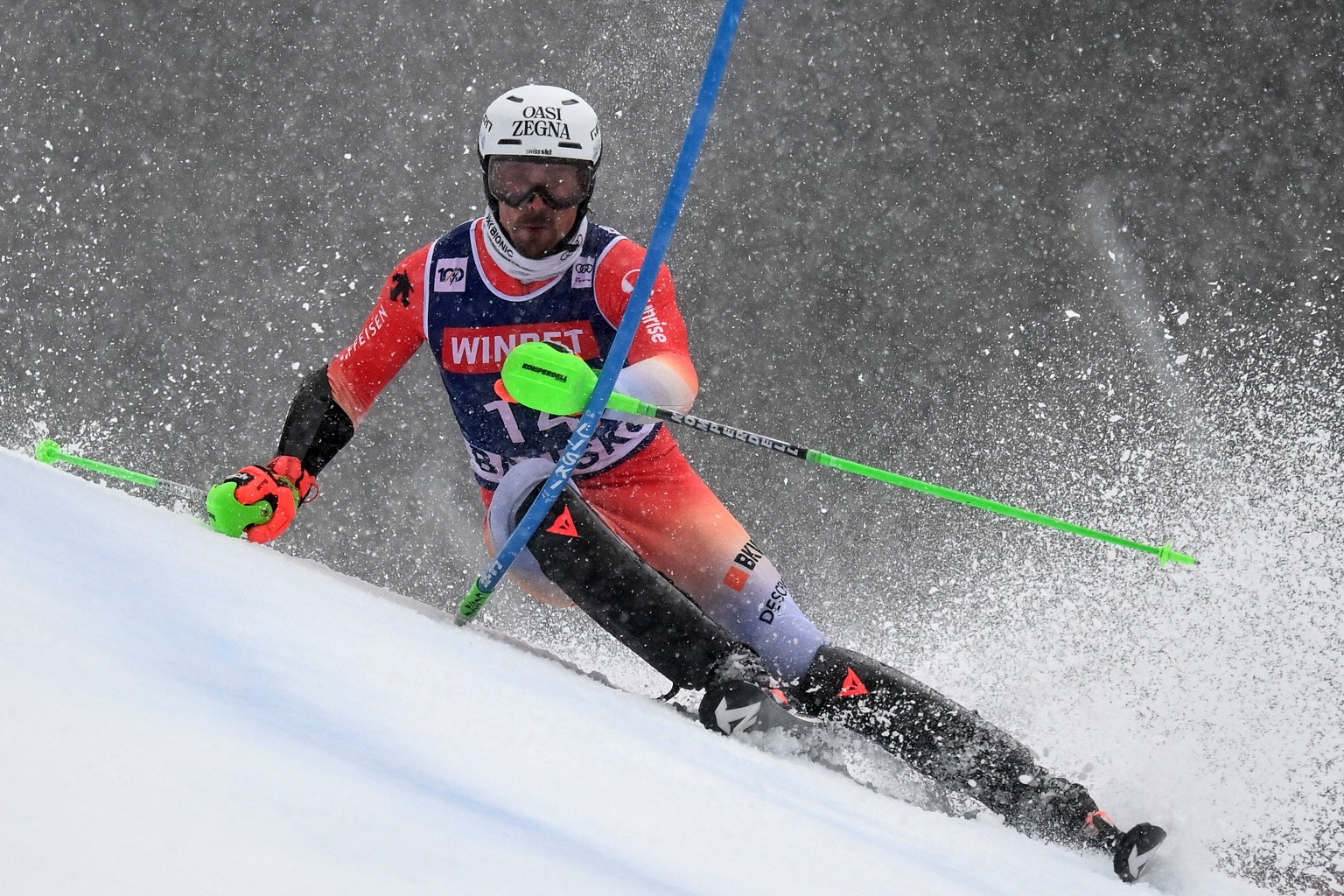 epa11144205 Marc Rochat of Switzerland in action during the first run in slalom race at the FIS Alpine Skiing World Cup event in Bansko, Bulgaria, 11 February 2024. EPA/VASSIL DONEV