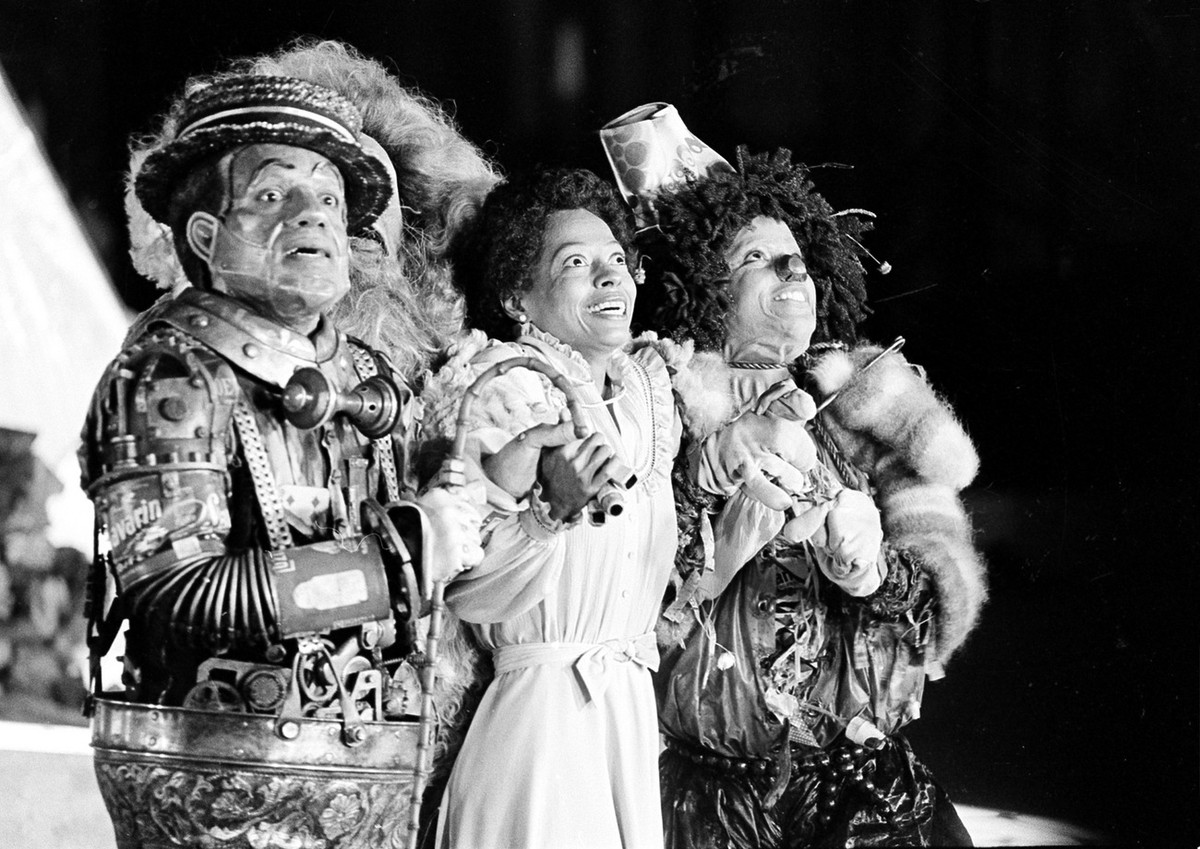 Diana Ross, center, as Dorothy, Michael Jackson, right, as Scarecrow, and Nipsey Russell as Tinman perform during filming of the musical "The Wiz" in New York's World Trade Center, Tues ...