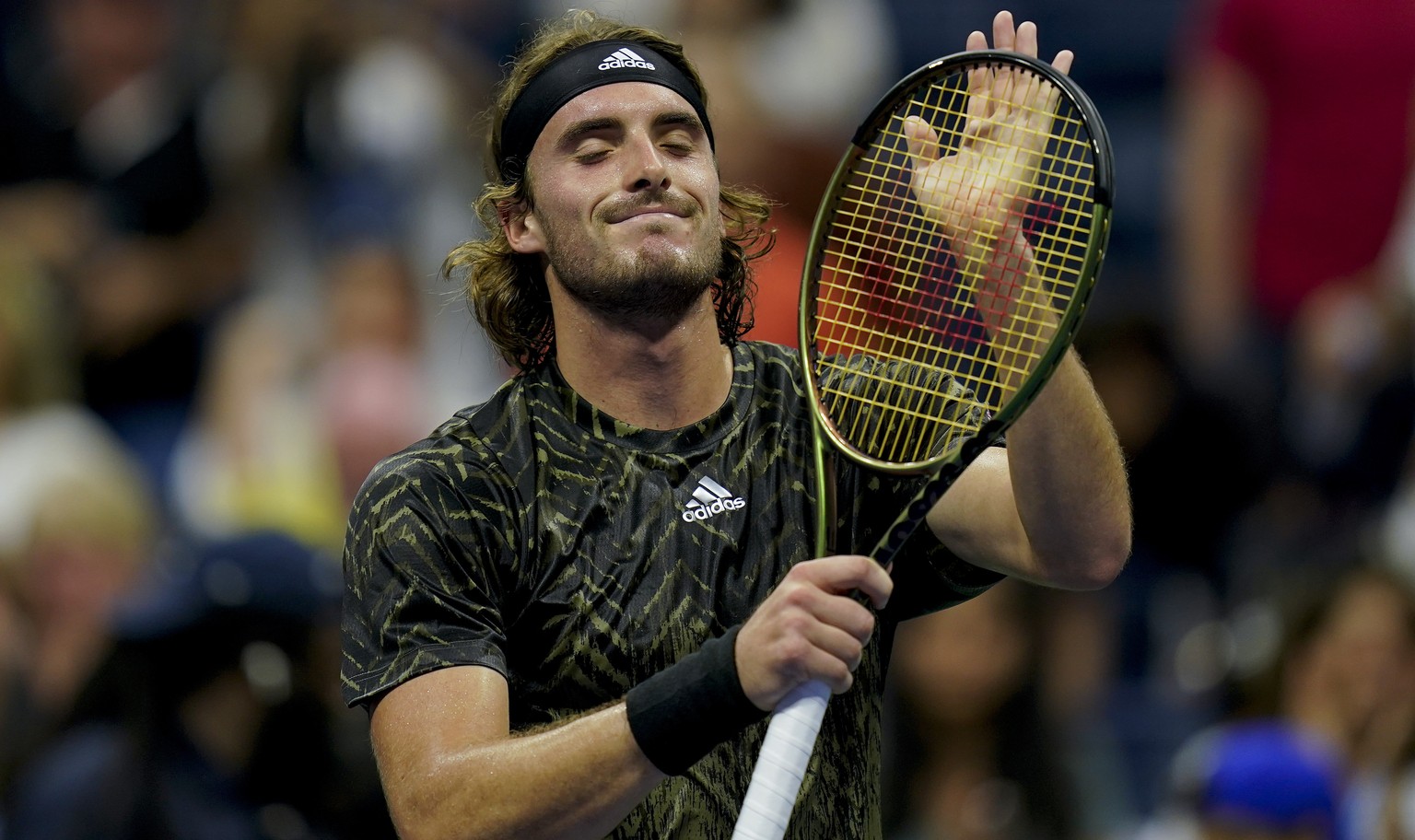 Stefanos Tsitsipas, of Greece, reacts after defeating Andy Murray, of Great Britain, during the first round of the US Open tennis championships, Monday, Aug. 30, 2021, in New York. (AP Photo/Seth Weni ...