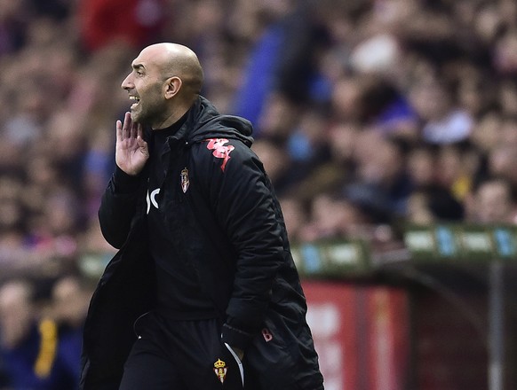 FILE - In this file photo dated Wednesday, Feb. 17, 2016, Sporting de Gijon&#039;s head coach Abelardo Fernandez, gives instructions during their Spanish La Liga soccer match against FC Barcelona, at  ...