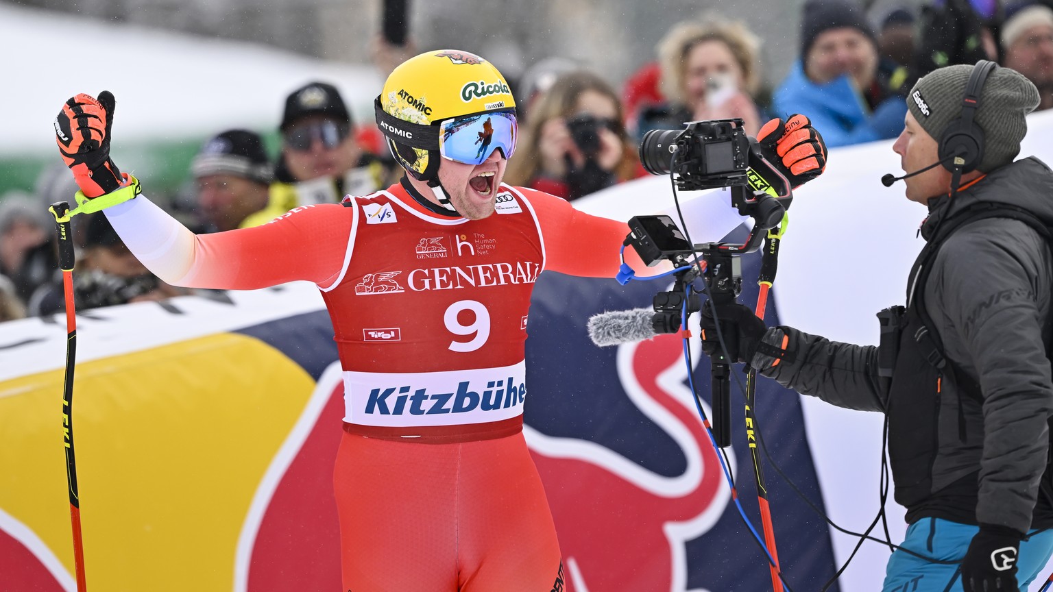 Niels Hintermann of Switzerland reacts in the finish area during the men&#039;s downhill race at the Alpine Skiing FIS Ski World Cup in Kitzbuehel, Austria, Friday, January 20, 2023. (KEYSTONE/Jean-Ch ...
