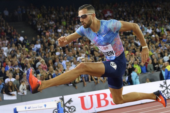 Kariem Hussein of Switzerland crosses a hurdle in the 400m Hurdles Men, during the Weltklasse IAAF Diamond League international athletics meeting in the Letzigrund stadium in Zurich, Switzerland, Thur ...