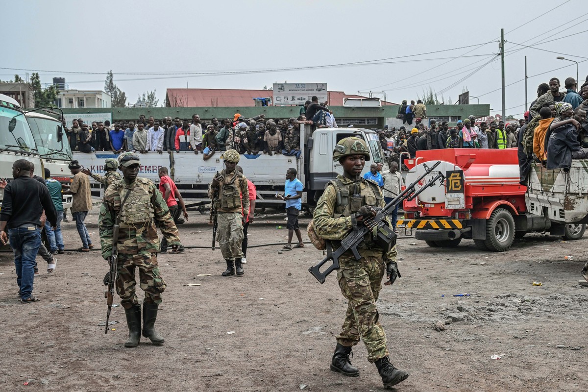 FILE - M23 rebels escort government soldiers and police who surrendered to an undisclosed location in Goma, Democratic republic of the Congo, Thursday, Jan. 30, 2025. (AP Photo/Moses Sawasawa, File)
C ...