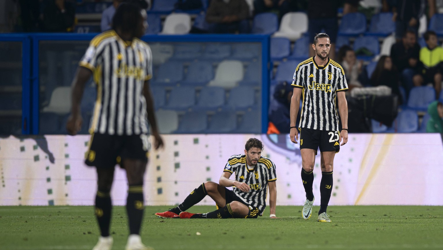 US Sassuolo v Juventus FC -Serie A Manuel Locatelli of Juventus FC and Adrien Rabiot of Juventus FC look dejected during the Serie A football match between US Sassuolo and Juventus FC. Reggio Emilia I ...