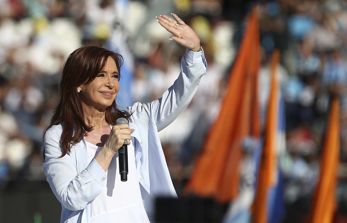 Argentina's former president who is running for senator, Cristina Fernandez de Kirchner, waves to supporters during a campaign rally at Racing Club stadium in Buenos Aires, Argentina, Monday, Oct ...