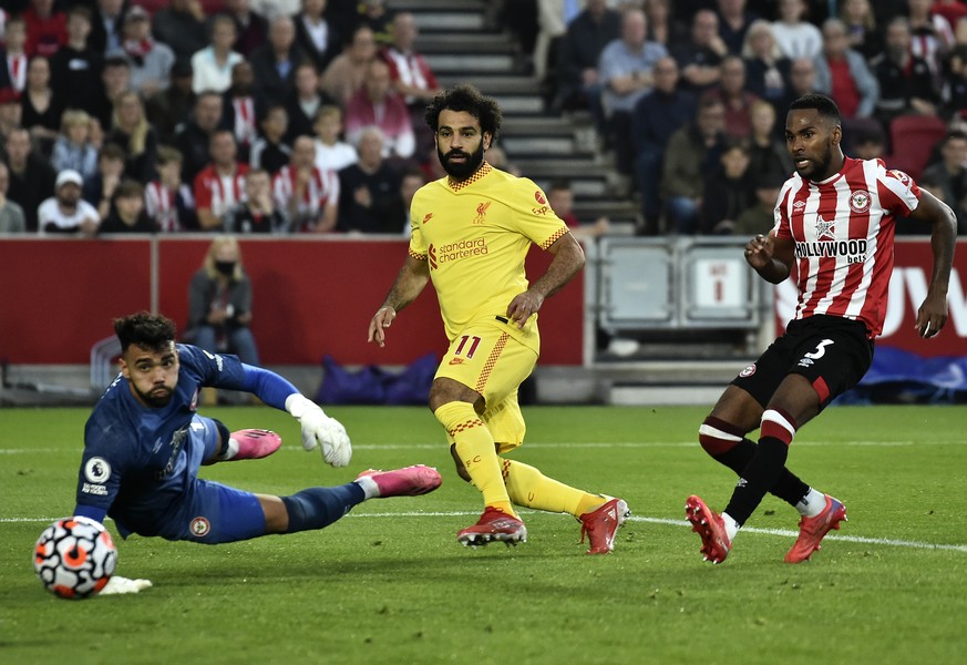 Liverpool&#039;s Mohamed Salah, center, scores his side&#039;s second goal during the English Premier League soccer match between Brentford and Liverpool at the Brentford Community Stadium in London,  ...