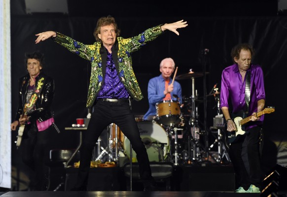 FILE - Ron Wood, from left, Mick Jagger, Charlie Watts and Keith Richards of the Rolling Stones perform during their concert in Pasadena, Calif. The Rolling Stones are releasing a new version of their ...