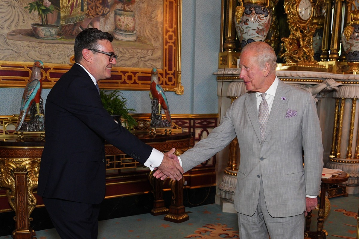 Britain's King Charles III welcomes Andy Burnham, during an audience at Buckingham Palace, London, where he invited the leader of the Labour Party to become Prime Minister and form a new governme ...