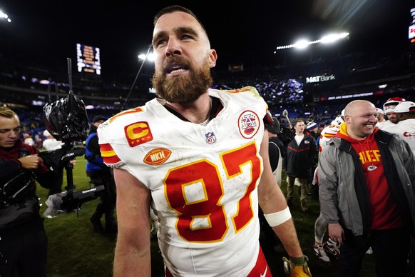epa11111807 Kansas City Chiefs tight end Travis Kelce on the field after the Chiefs defeated the Baltimore Ravens during the AFC conference championship game between the Baltimore Ravens and the Kansa ...