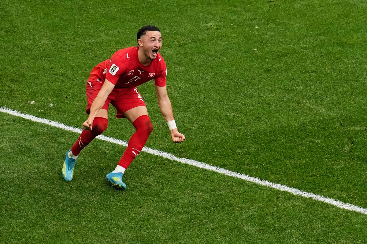 Switzerland's Ruben Vargas (17) celebrates after making the winning kick in a penalty shootout during the World Cup round of 16 soccer match between Switzerland and Colombia in Vancouver, British ...
