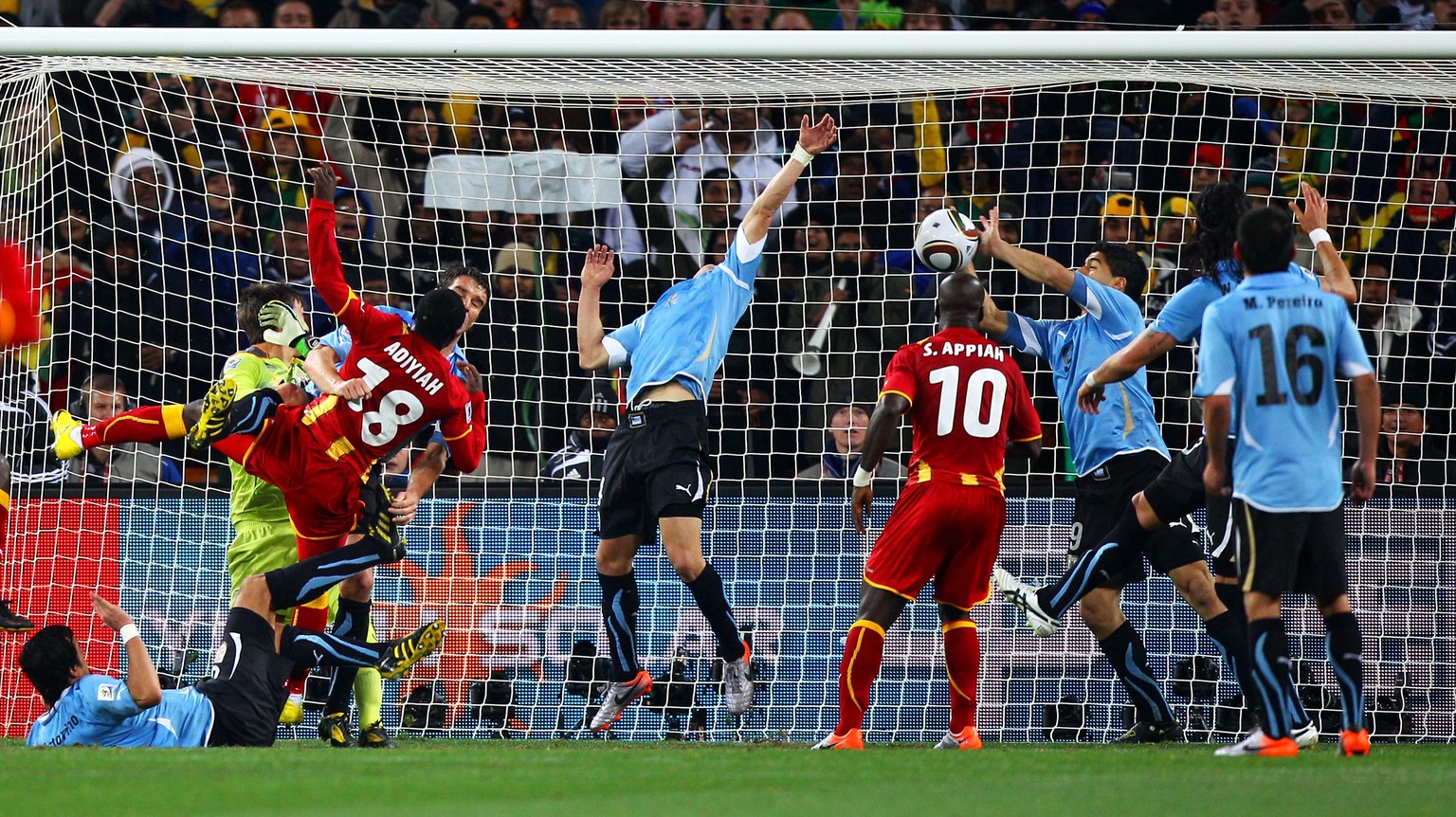 JOHANNESBURG, SOUTH AFRICA - JULY 02: Luis Suarez of Uruguay handles the ball on the goal line, for which he is sent off, during the 2010 FIFA World Cup South Africa Quarter Final match between Urugua ...