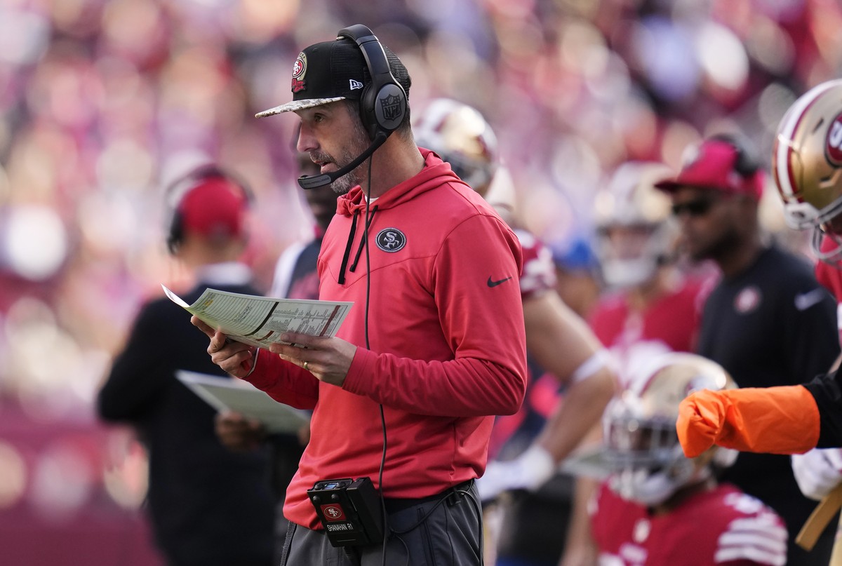 FILE - San Francisco 49ers coach Kyle Shanahan watches from the sideline during the first half of the team's NFL football game against the New Orleans Saints in Santa Clara, Calif., Nov. 27, 2022 ...