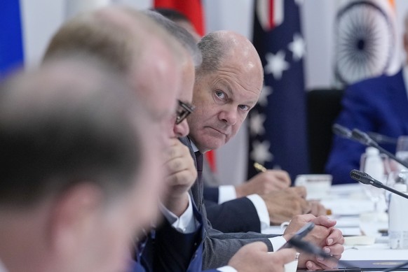German Chancellor Olaf Scholz and other G7 leaders participate in an event on global infrastructure and investment during the G7 Summit in Hiroshima, Japan, Saturday, May 20, 2023. (AP Photo/Susan Wal ...