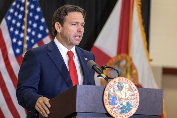 epa11609870 Florida Governor Ron DeSantis speaks during a press conference regarding the assassination attempt on US former President Donald Trump, at Palm Beach County Sheriff&#039;s Office Training  ...