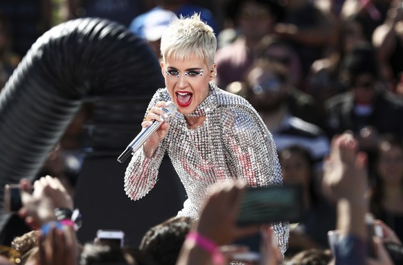 FILE - In this Monday, June 12, 2017, file photo, Katy Perry performs during &#039;Katy Perry - Witness World Wide&#039; exclusive YouTube Livestream Concert at Ramon C. Cortines School of Visual and  ...