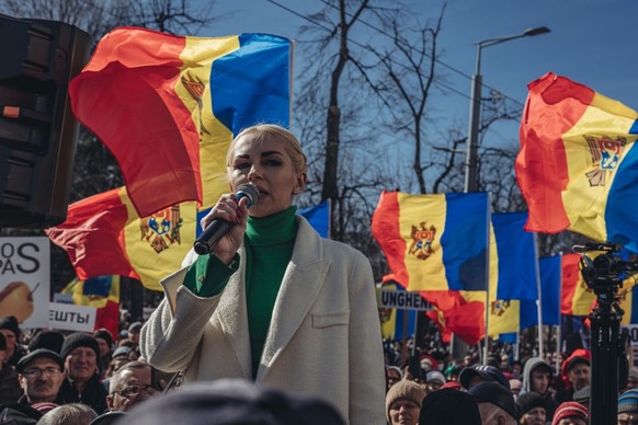 CHISINAU, MOLDOVA - MARCH 12: Marina Tauber, vice-president of the Sor Party speaks to crowd as thousands of people gather for anti-government protests in Moldova&#039;s capital Chisinau amid rising c ...
