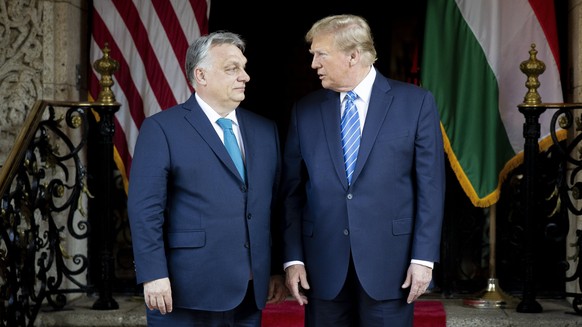 epa11208138 A handout photo made available by the Hungarian Prime Minister&#039;s Office shows ..former US President and Republican presidential candidate Donald Trump (R) and Hungarian Prime Minister ...