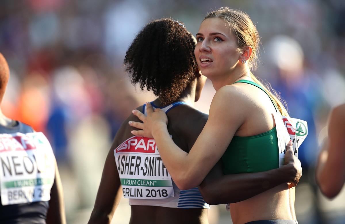 Berlin, 07.08.2018, Europameisterschaft 2018, Semi Final 1 100 m , Frauen Bild: Siegerin Dina Asher-Smith (GBR) , Kristina Timanovskaya (BLR) Berlin 2018 Leichtathletik EM *** Berlin 07 08 2018 Europe ...
