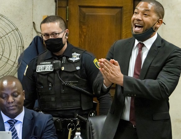 epa09817419 US actor Jussie Smollett (R) proclaims his innocence as he is sentenced to jail at the Leighton Criminal Courthouse for staging an attack on himself in Chicago, Illinois, USA, 10 March 202 ...