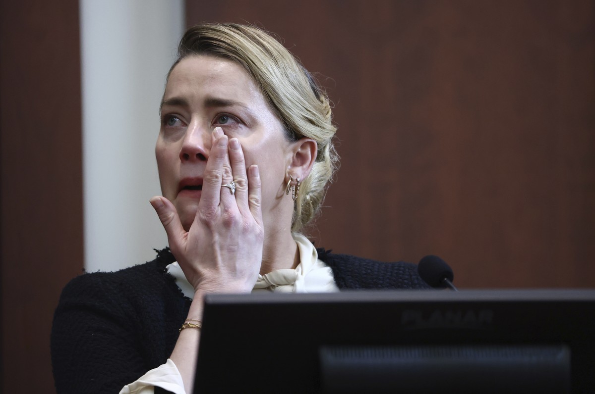 Actor Amber Heard testifies in the courtroom at the Fairfax County Circuit Court in Fairfax, Va., Thursday, May 5, 2022. Actor Johnny Depp sued his ex-wife actor Amber Heard for libel in Fairfax Count ...