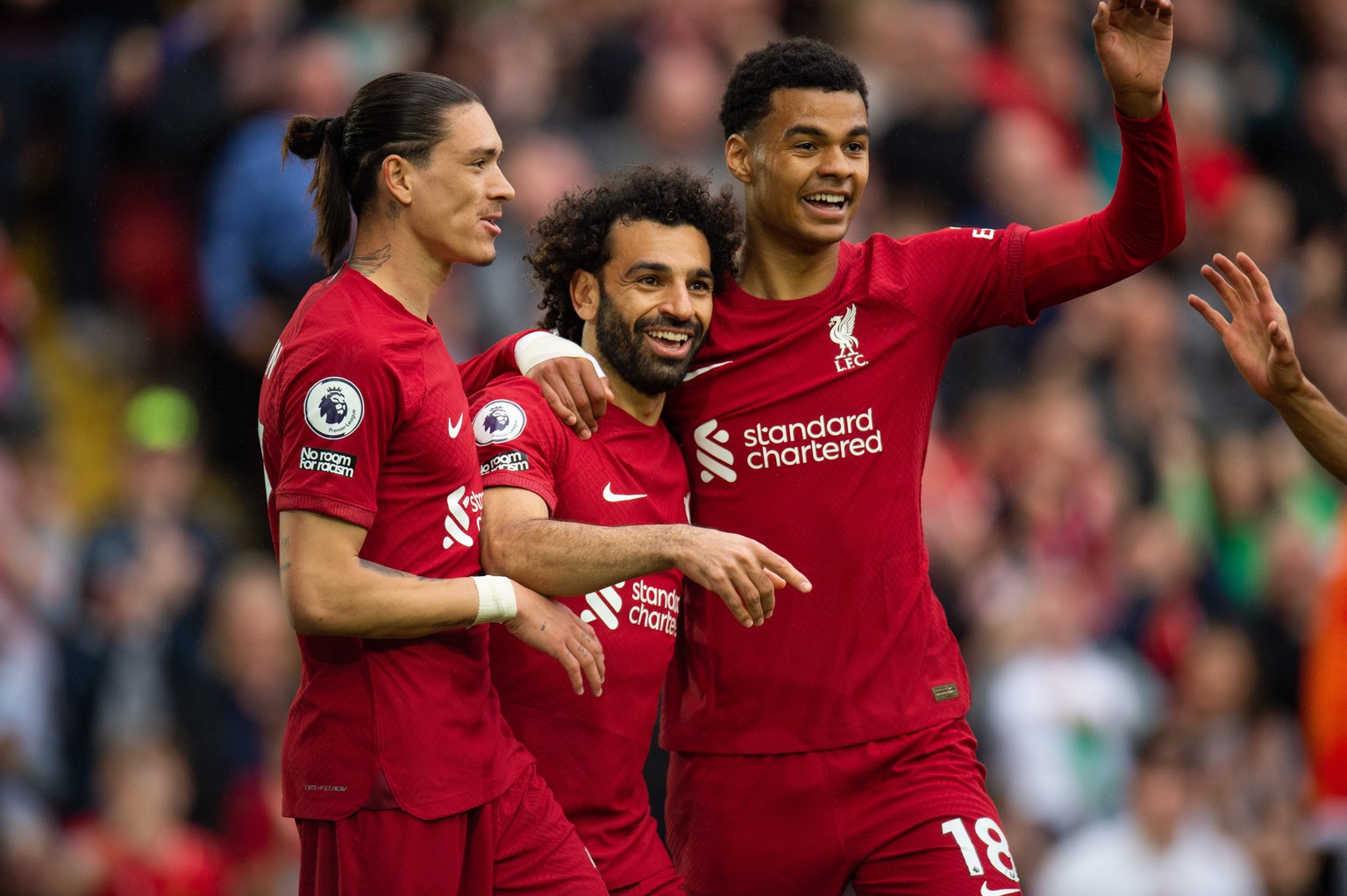 epa10612460 Liverpool&#039;s Mohamed Salah (C) celebrates with his teammates Darwin Nunez (L) and Cody Gapko (R) after scoring the 1-0 goal during the English Premier League soccer match between Liver ...